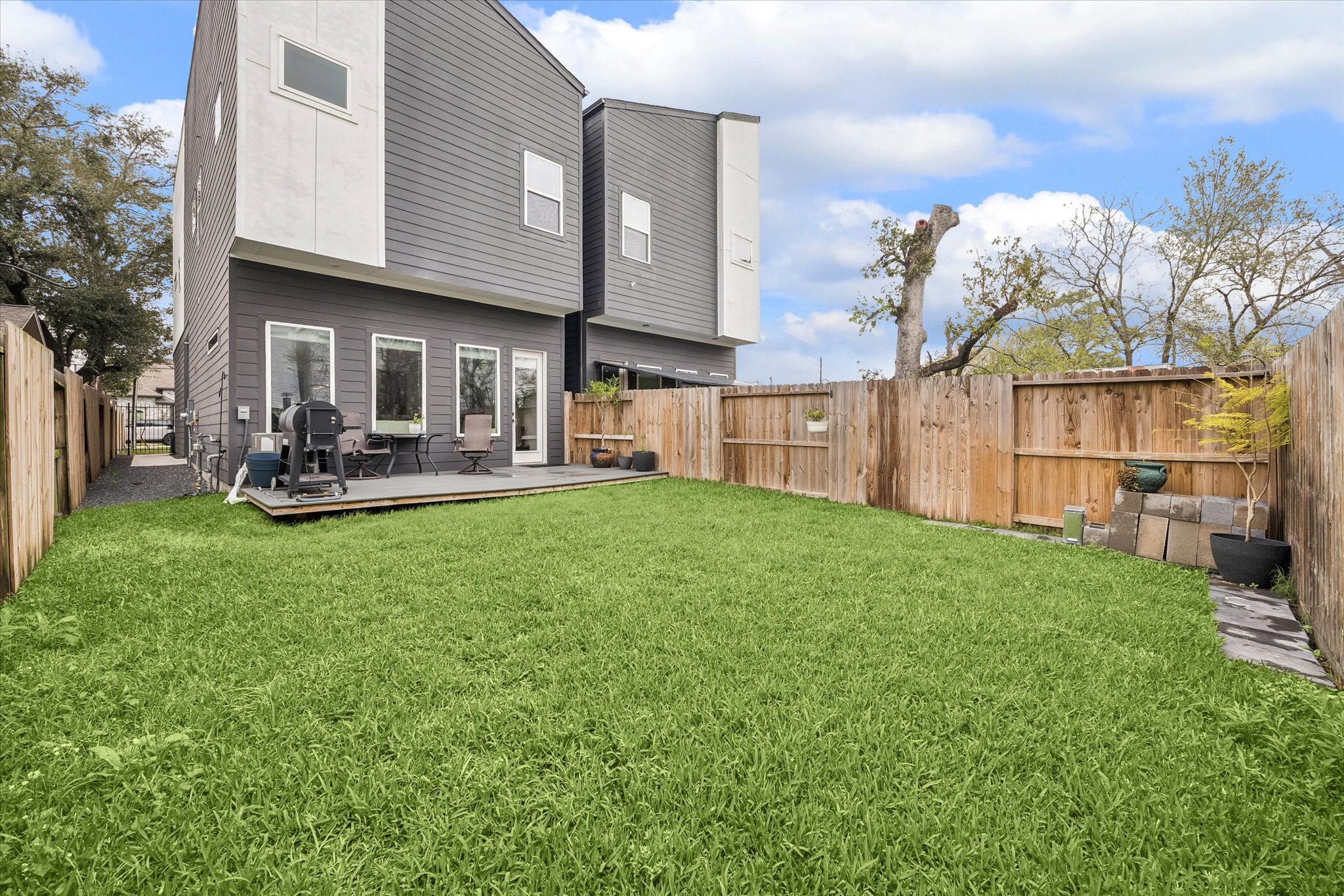 5318 Wunder Lane Houston, TX 77091 - Photo 23 of 25 a view of a house with a yard and sitting area