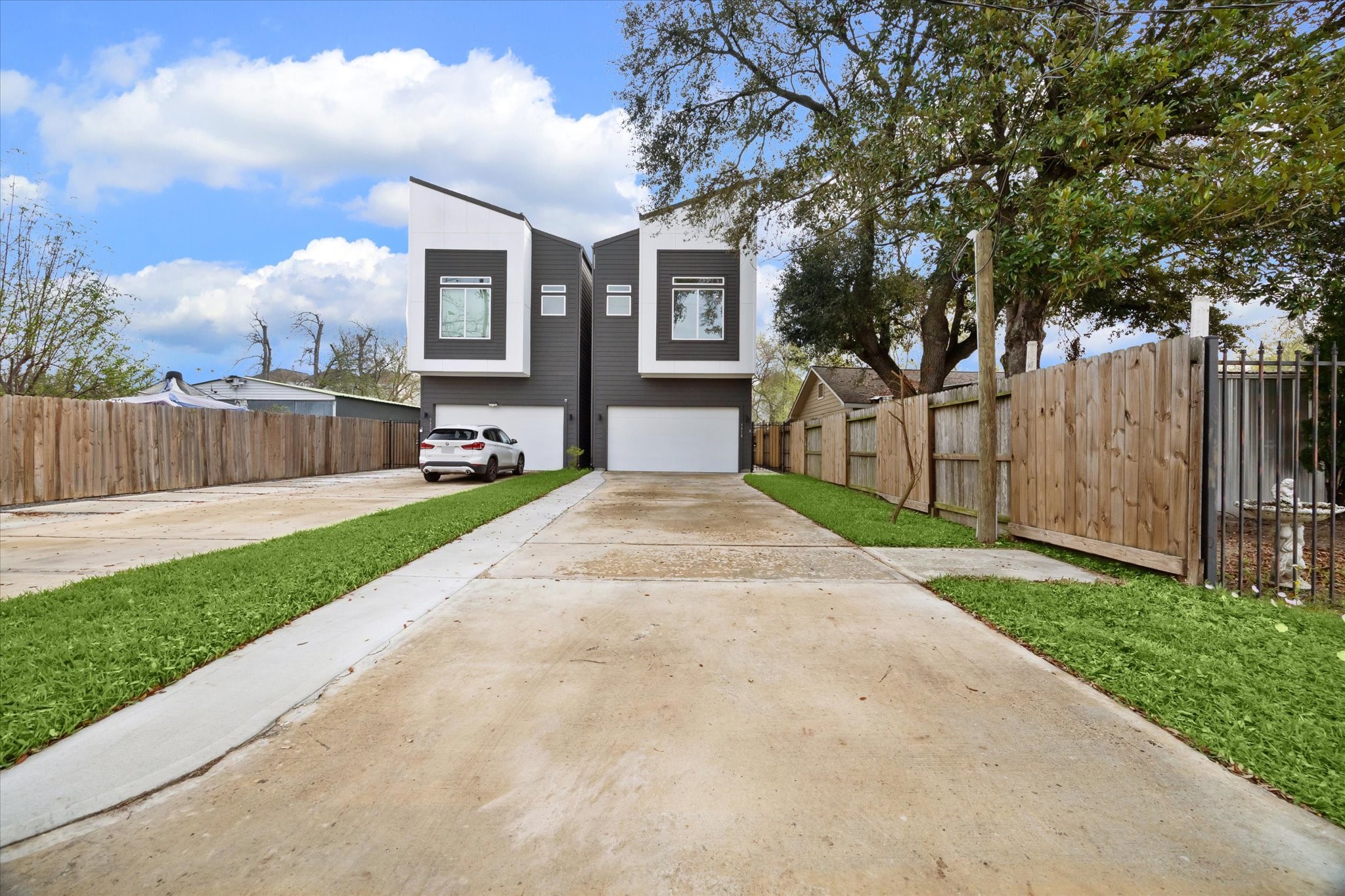 5318 Wunder Lane Houston, TX 77091 - Photo 25 of 25 a front view of a house with a yard and shrubs