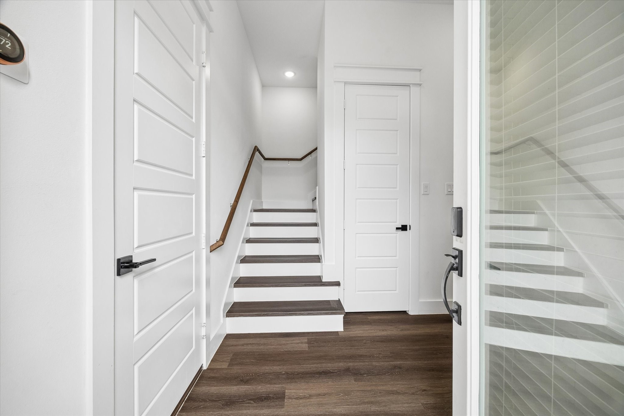 5318 Wunder Lane Houston, TX 77091 - Photo 3 of 25 a view of entryway with wooden floor and staircase