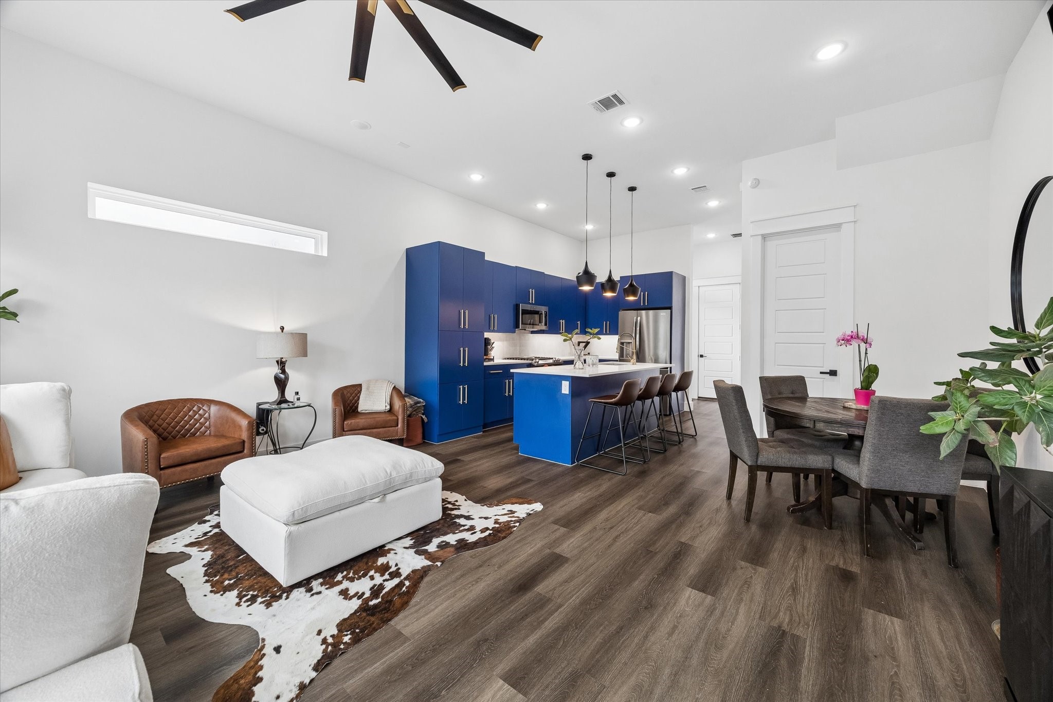 5318 Wunder Lane Houston, TX 77091 - Photo 6 of 25 a living room with furniture kitchen view and a wooden floor