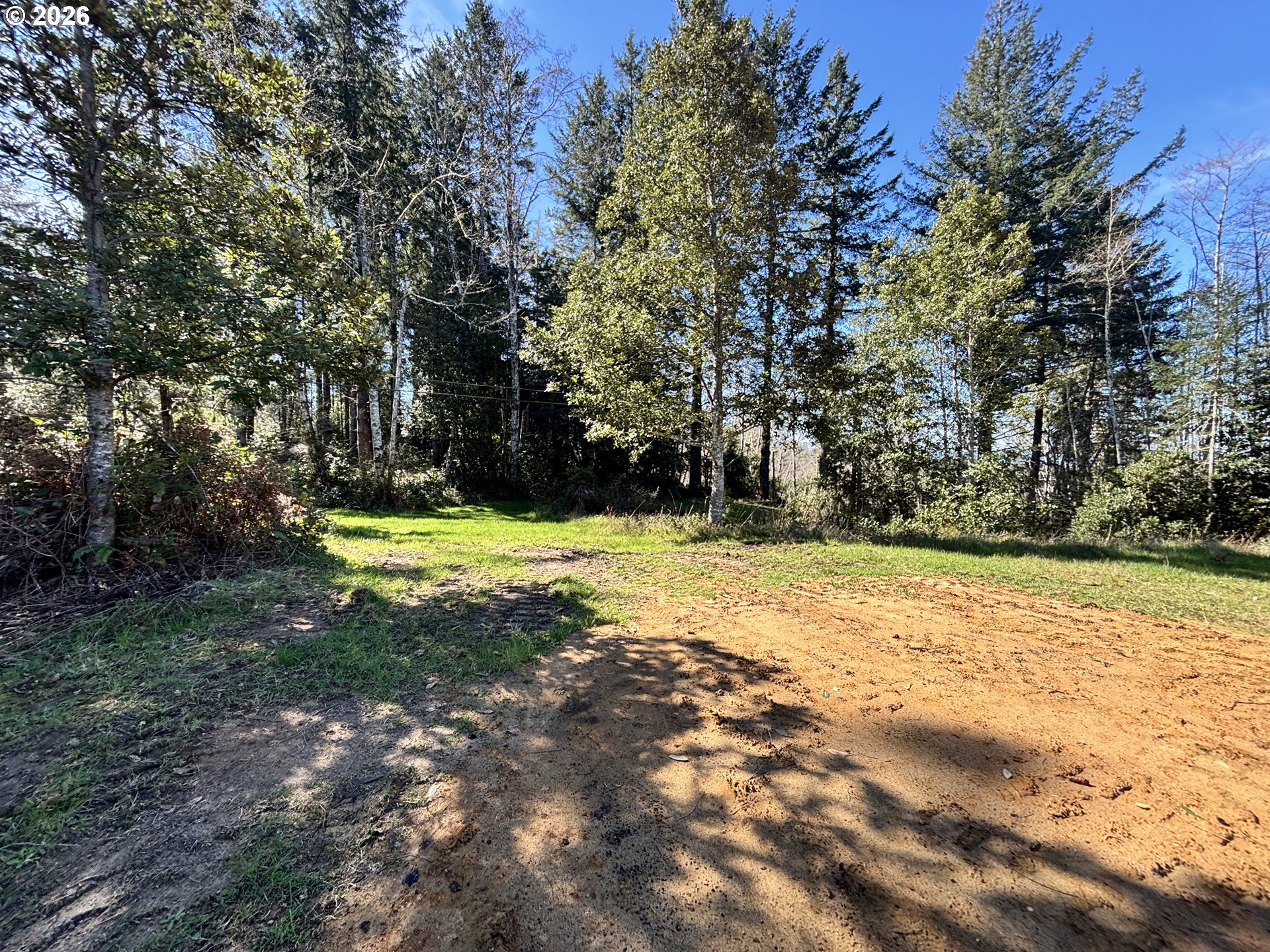 96475 Cape Ferrelo Road Brookings, OR 97415 - Photo 13 of 30 a view of swimming pool with a yard