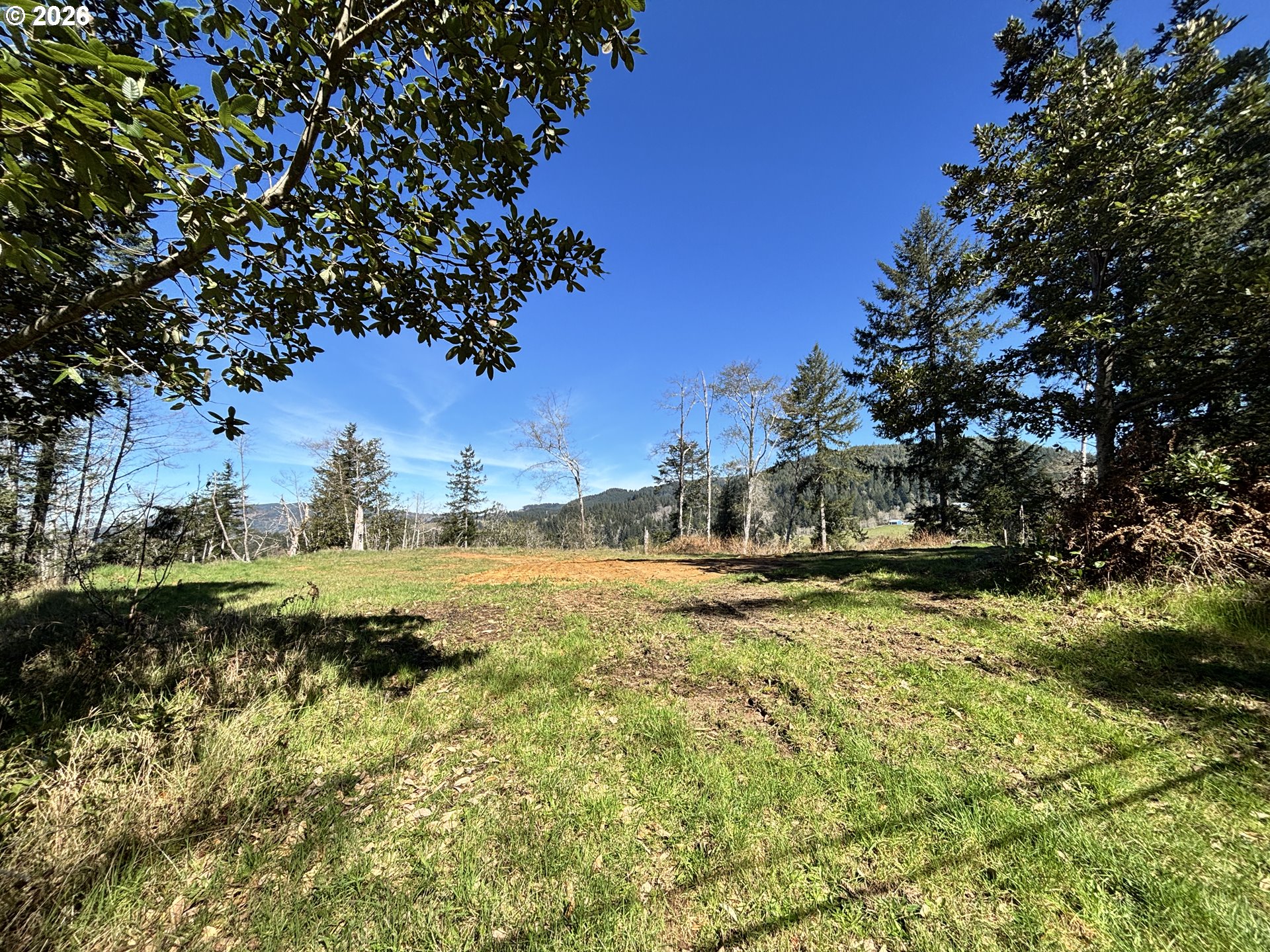 96475 Cape Ferrelo Road Brookings, OR 97415 - Photo 5 of 30 a view of a lake with houses