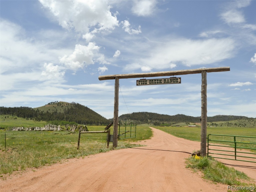 376 Deer Crossing Road Tie Siding, WY 82084 - Photo 13 of 28 a view of a street with an ocean view