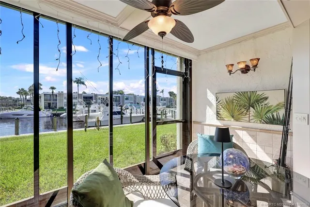 a room with furniture and a large window