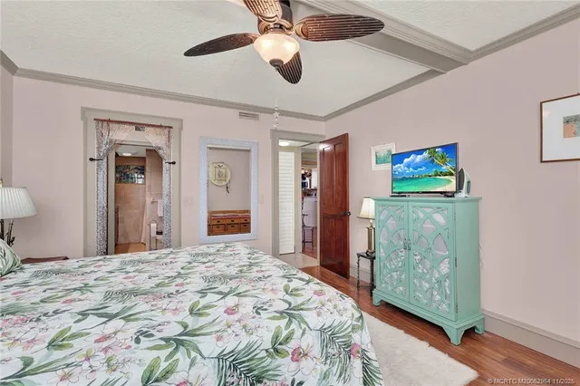 a bathroom with a granite countertop sink a mirror and vanity