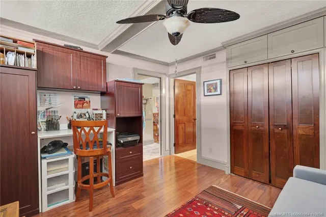 a bathroom with a granite countertop sink a toilet and a bathtub