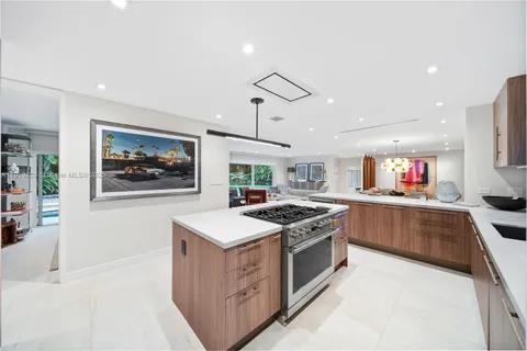 a spacious bedroom with a bed and a large mirror