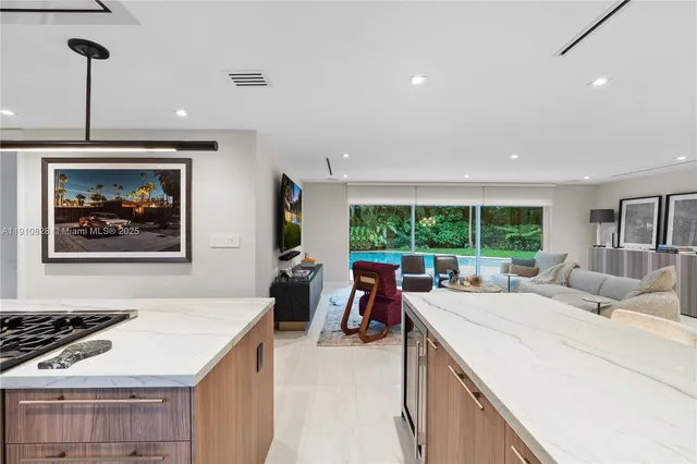 a bedroom with a large bed and a couch