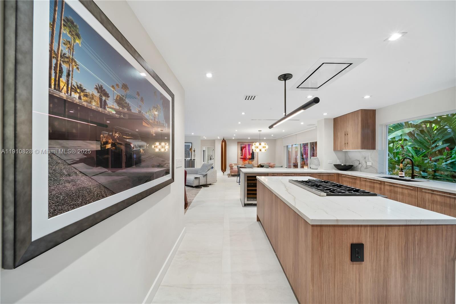 1075 Northeast 99th Street Miami Shores, FL 33138 - Photo 25 of 63 a kitchen with a stove and a refrigerator