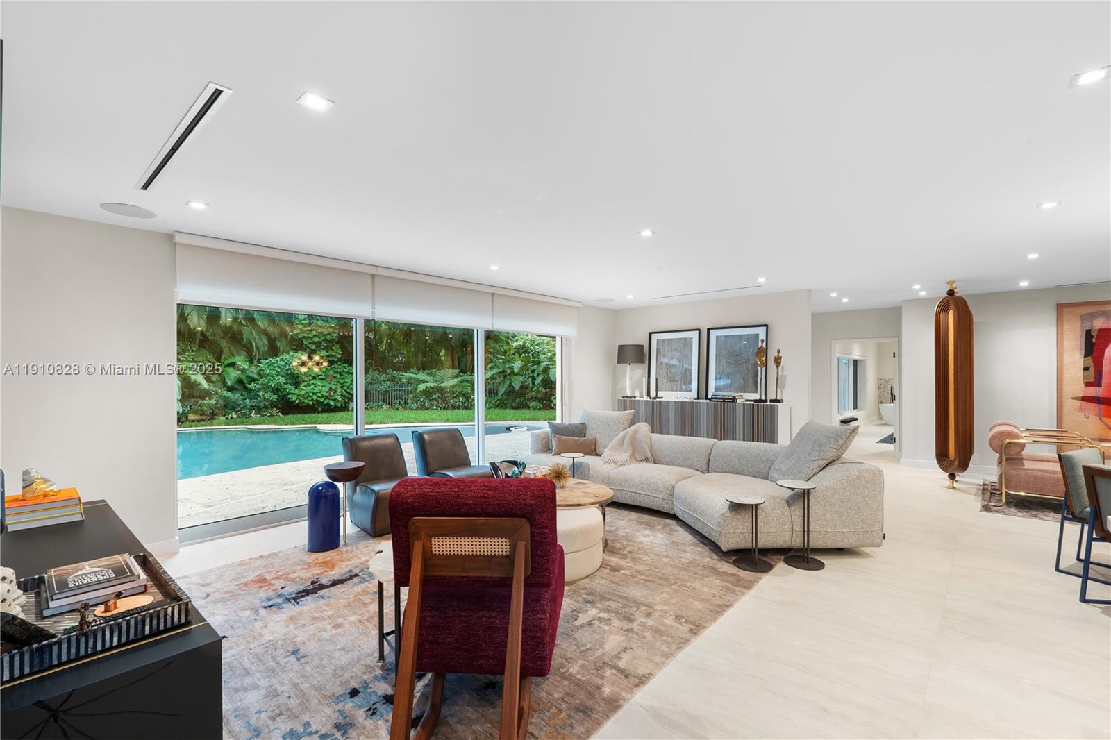 1075 Northeast 99th Street Miami Shores, FL 33138 - Photo 4 of 63 a living room with furniture and a large window