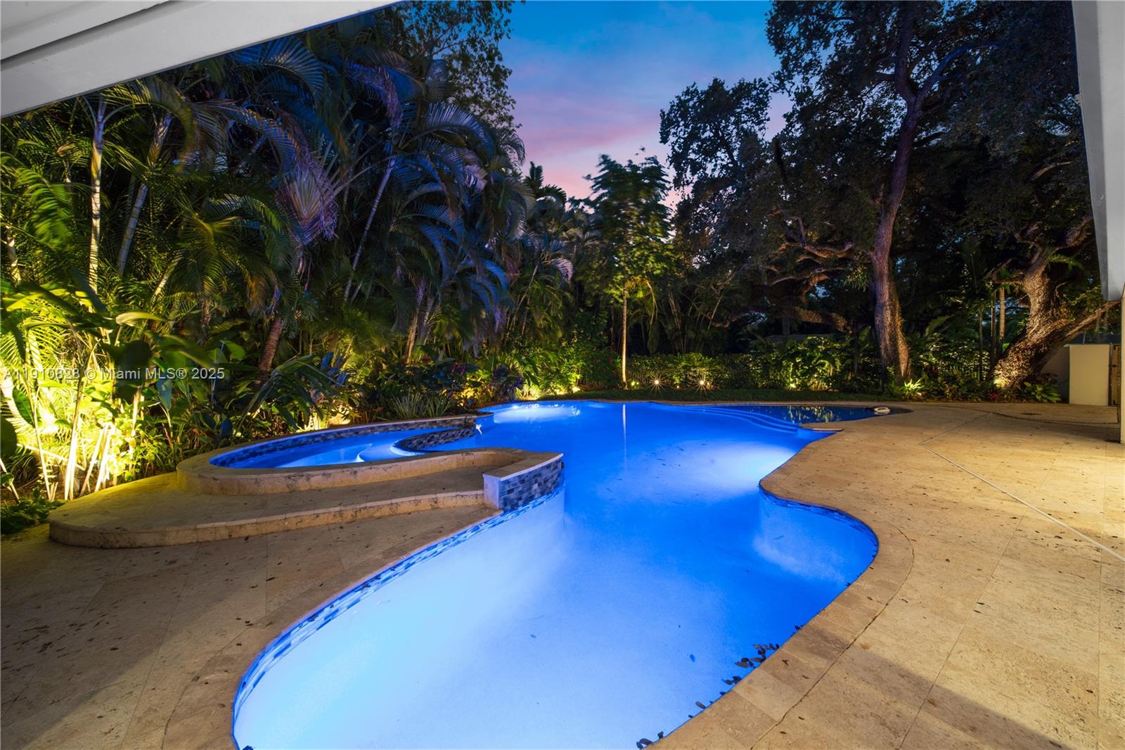 1075 Northeast 99th Street Miami Shores, FL 33138 - Photo 48 of 63 a view of yard with swimming pool and trees