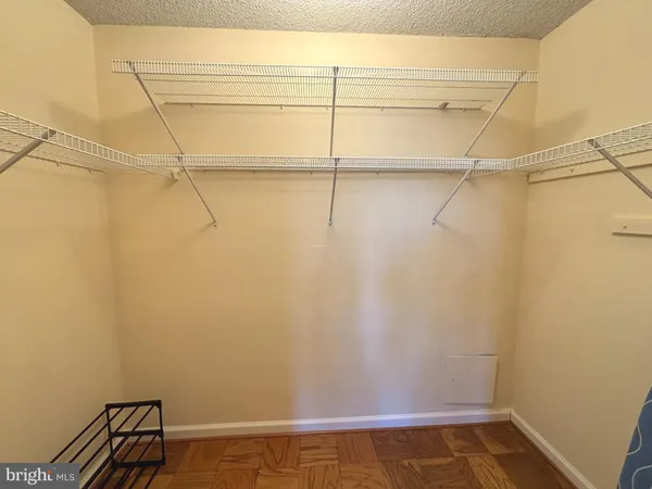a view of a room with racks on the wall