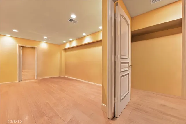 a view of a swimming pool with a table and chairs