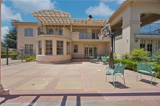 an aerial view of house with yard