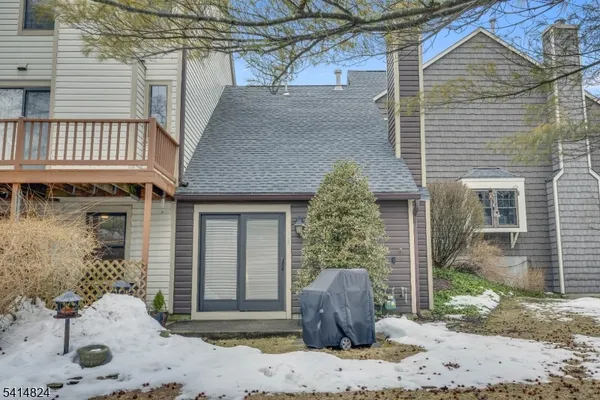 a view of an outdoor space and tennis court