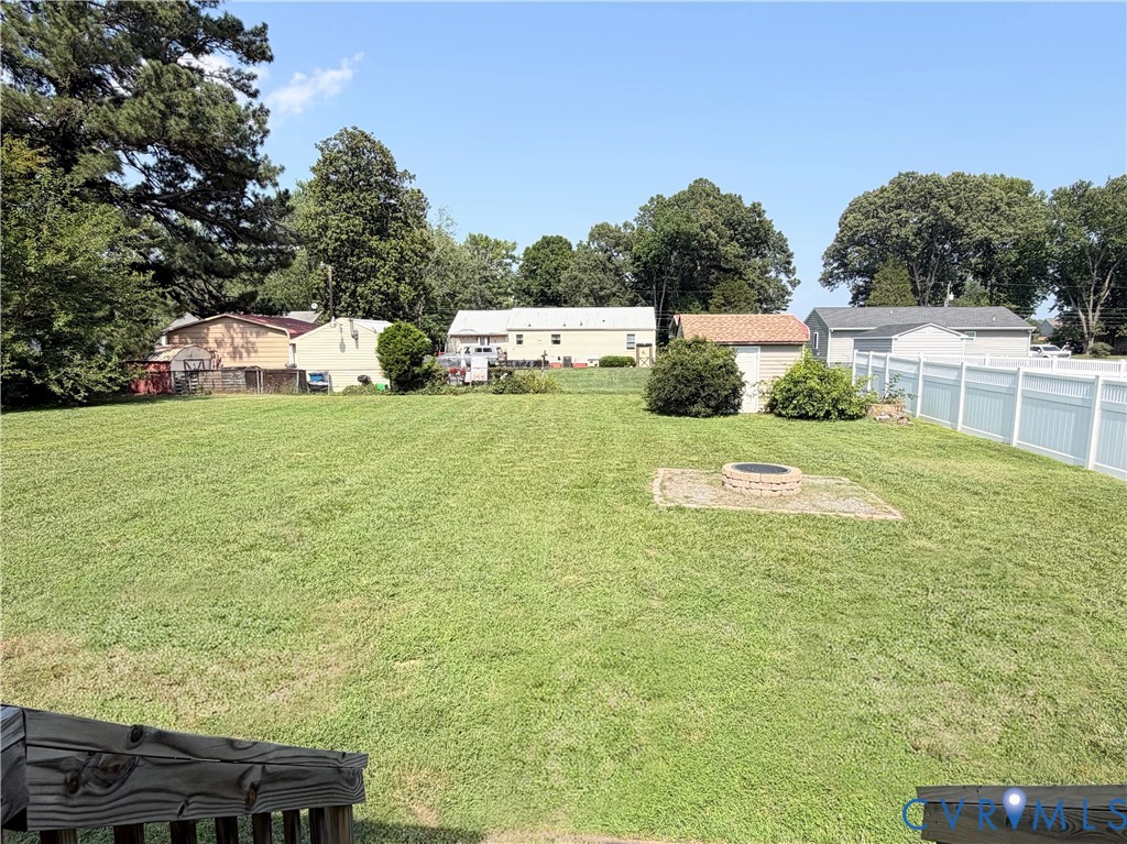 7547 Media Park Road Henrico, VA 23231 - Photo 19 of 21 Expansive backyard featuring a manicured lawn, a s