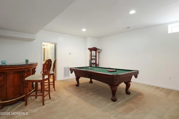 a view of a livingroom with furniture