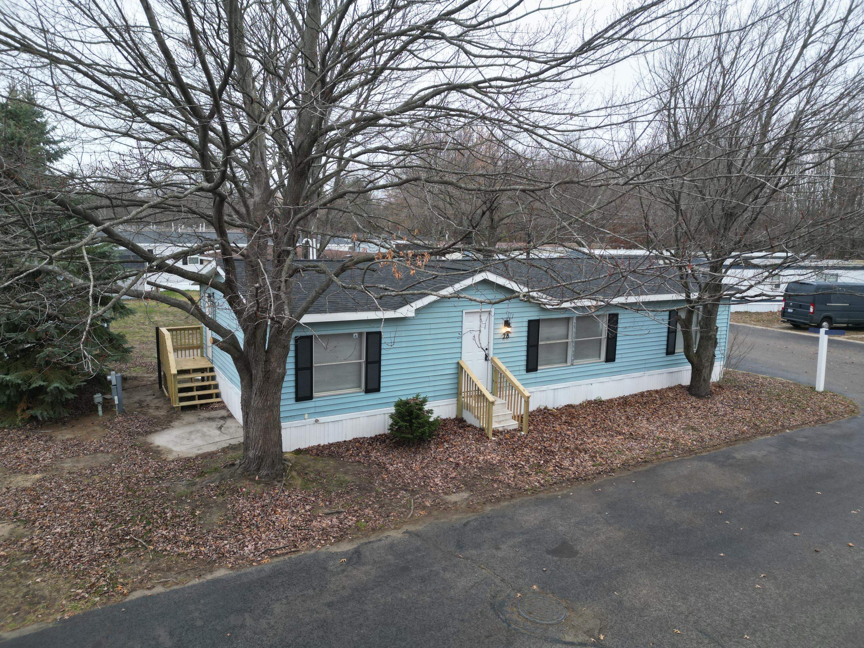 1281 East Pontaluna Road, Unit 28 Norton Shores, MI 49456 - Photo 17 of 17 DJI_0818