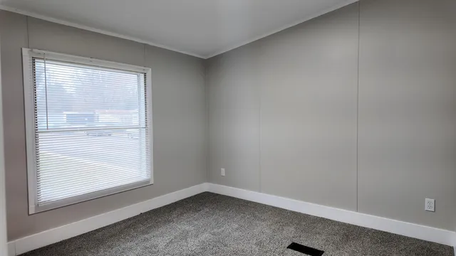 $79,900 | 1281 East Pontaluna Road, Unit 28, Spring Lake, MI 49456