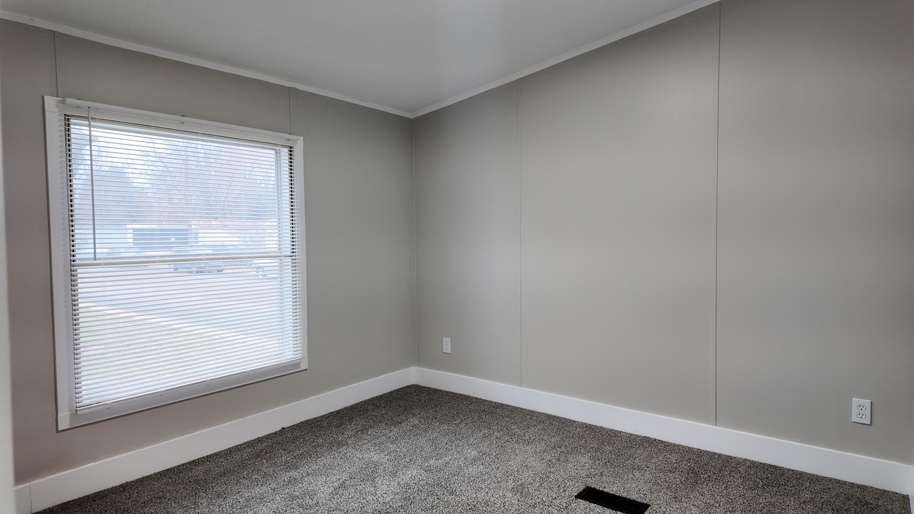 1281 East Pontaluna Road, Unit 28 Norton Shores, MI 49456 - Photo 5 of 17 DJI_20251118133334_0919_D