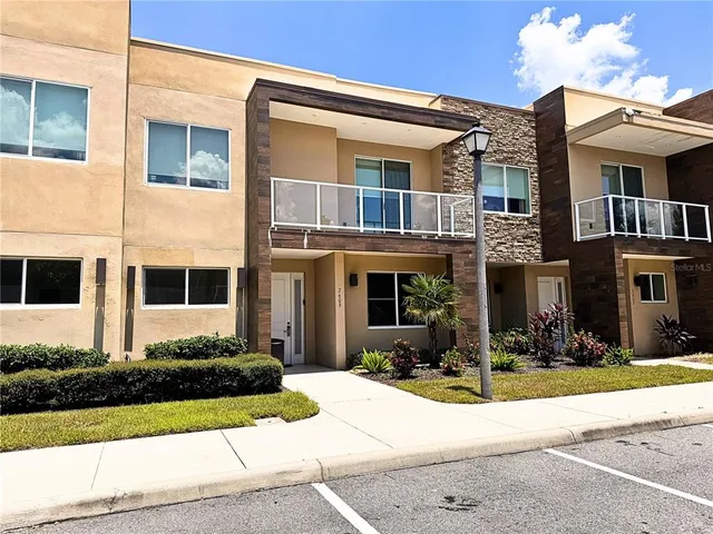 a front view of a building with street view