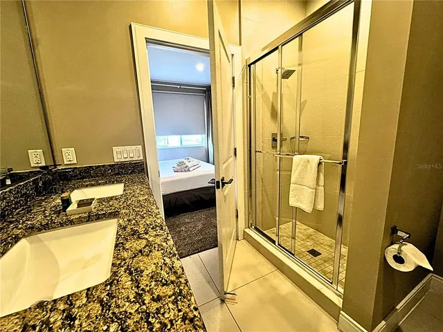 a living room with a couch and a flat screen tv