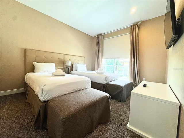 a view of a balcony with chairs