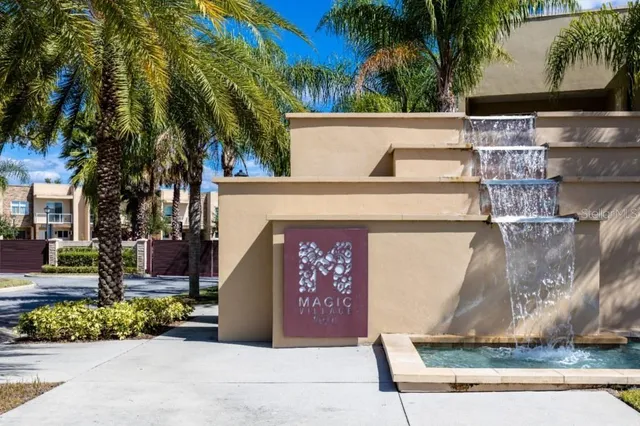 a view of swimming pool with outdoor seating and plants