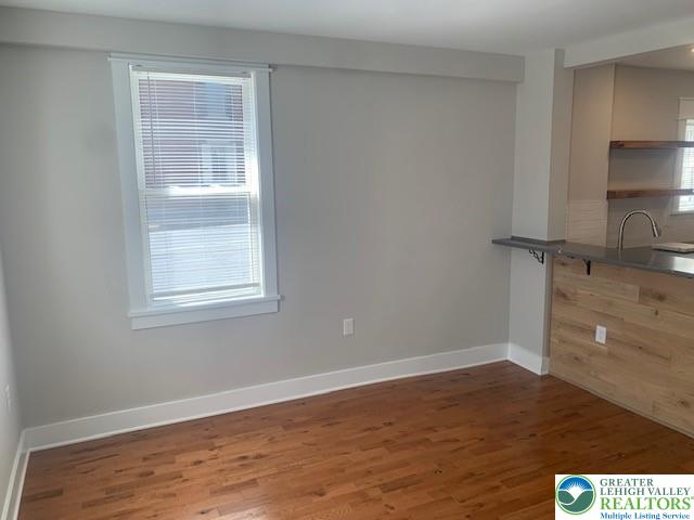 303 East Church Street, Unit A Bethlehem, PA 18018 - Photo 11 of 25 a view of an empty room with wooden floor and a window