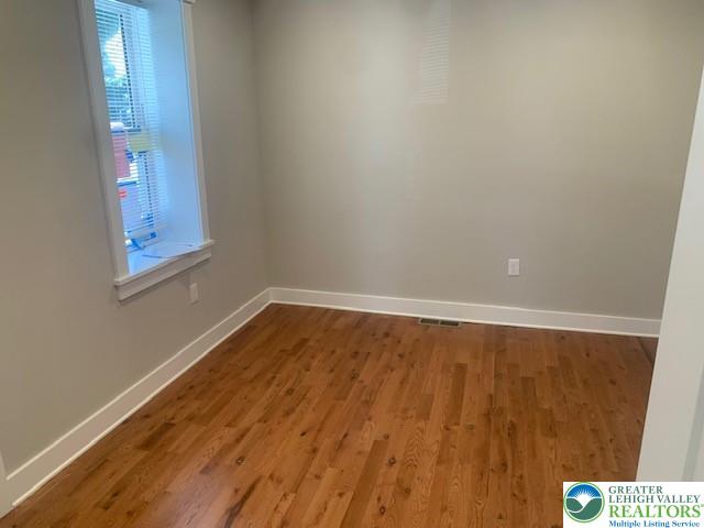 303 East Church Street, Unit A Bethlehem, PA 18018 - Photo 15 of 25 a view of wooden floor and windows in a room