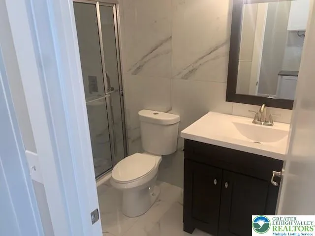 a bathroom with a sink and a toilet