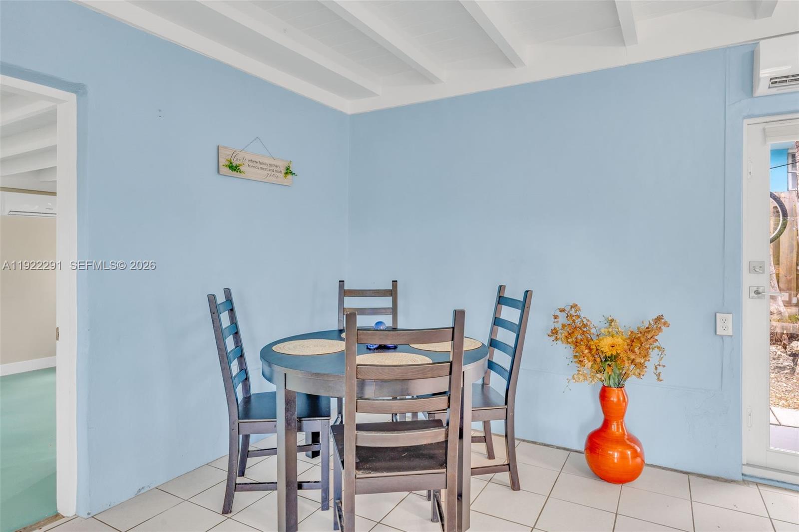 40 Pirates Drive Key Largo, FL 33037 - Photo 19 of 38 a dining room with furniture and wooden floor