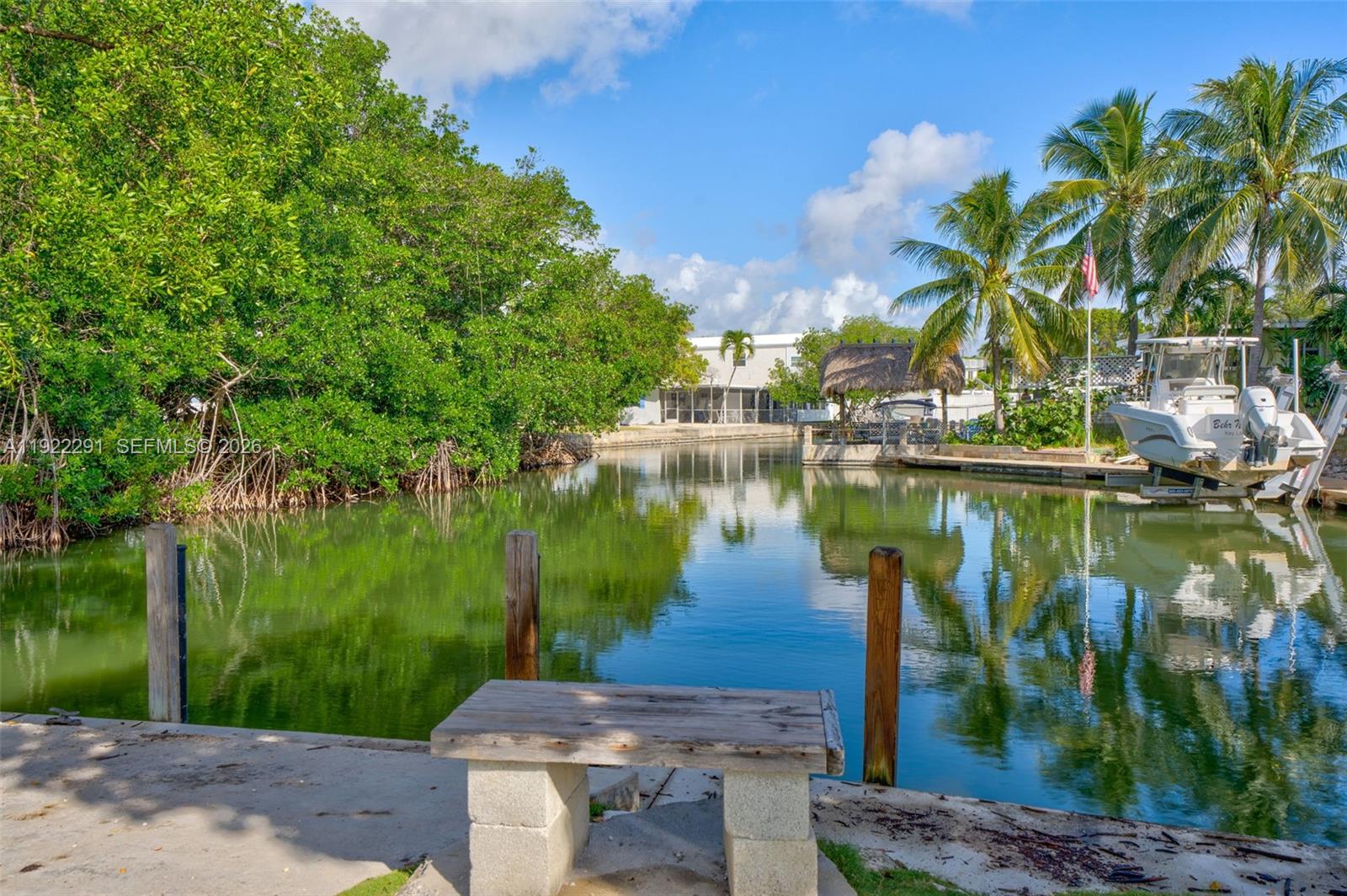 40 Pirates Drive Key Largo, FL 33037 - Photo 33 of 38 a view of a lake with a large trees