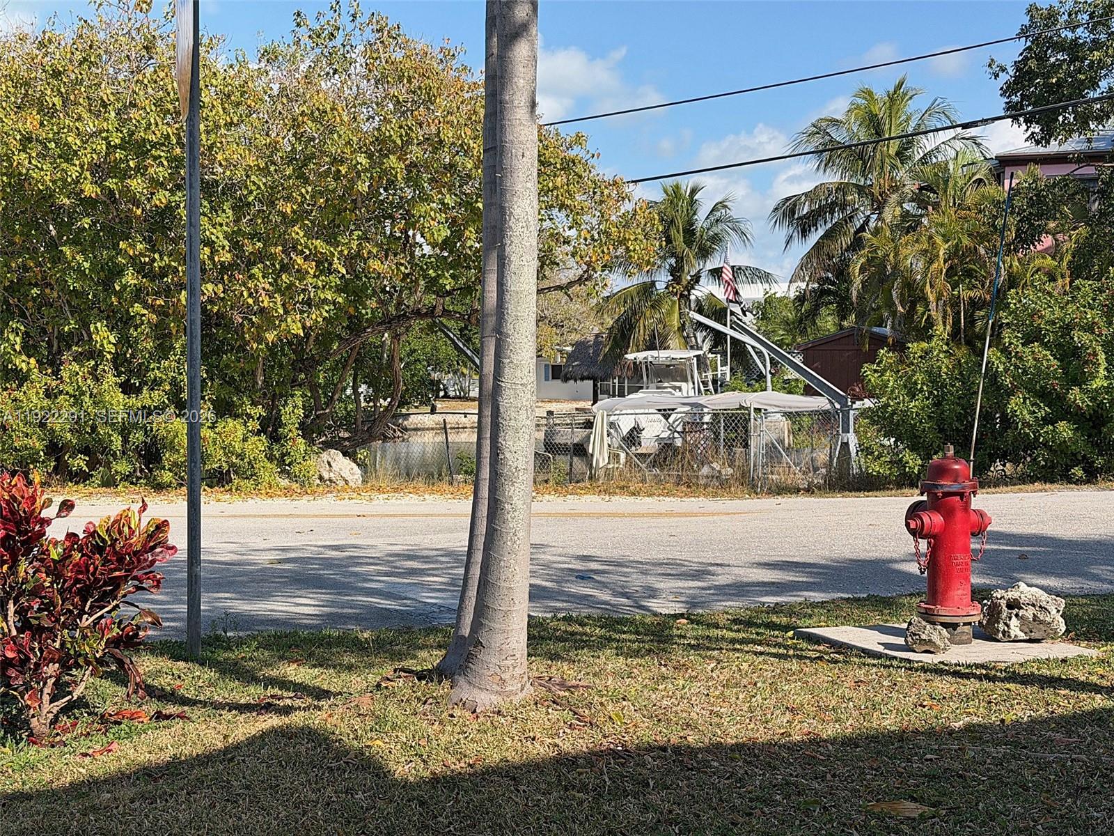 40 Pirates Drive Key Largo, FL 33037 - Photo 6 of 38 a view of a yard in front of house