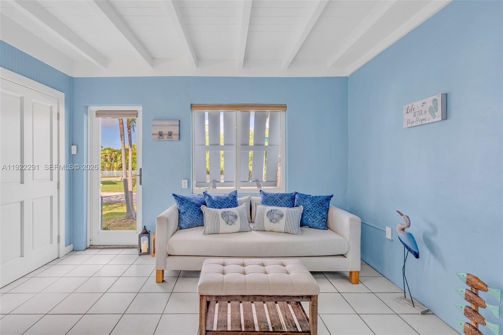 40 Pirates Drive Key Largo, FL 33037 - Photo 9 of 38 a living room with furniture and a window
