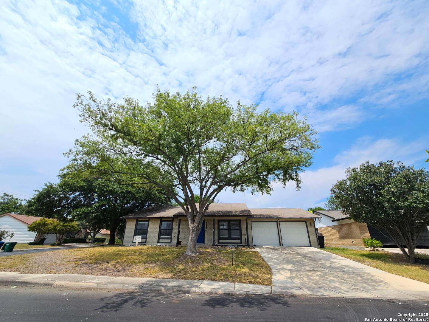 5303 Walnut Vista Drive San Antonio, TX 78247 - Photo 1 of 18 a house with trees in front of it