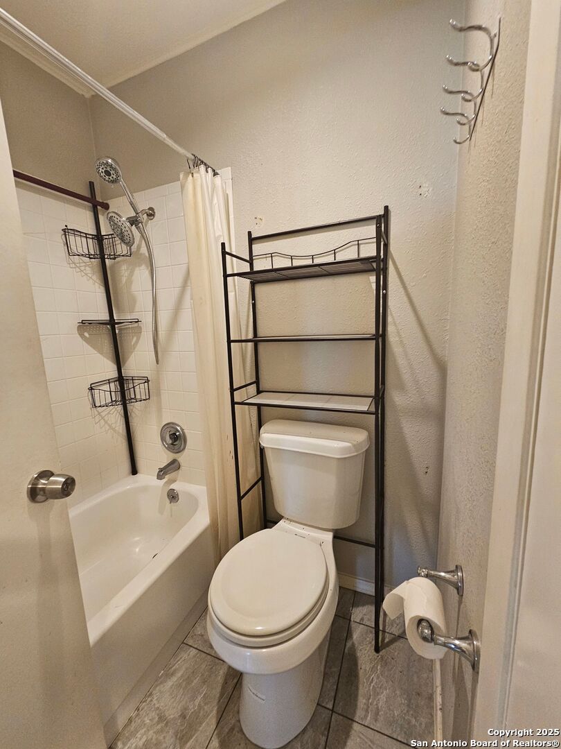 5303 Walnut Vista Drive San Antonio, TX 78247 - Photo 15 of 18 a bathroom with a toilet and a shower