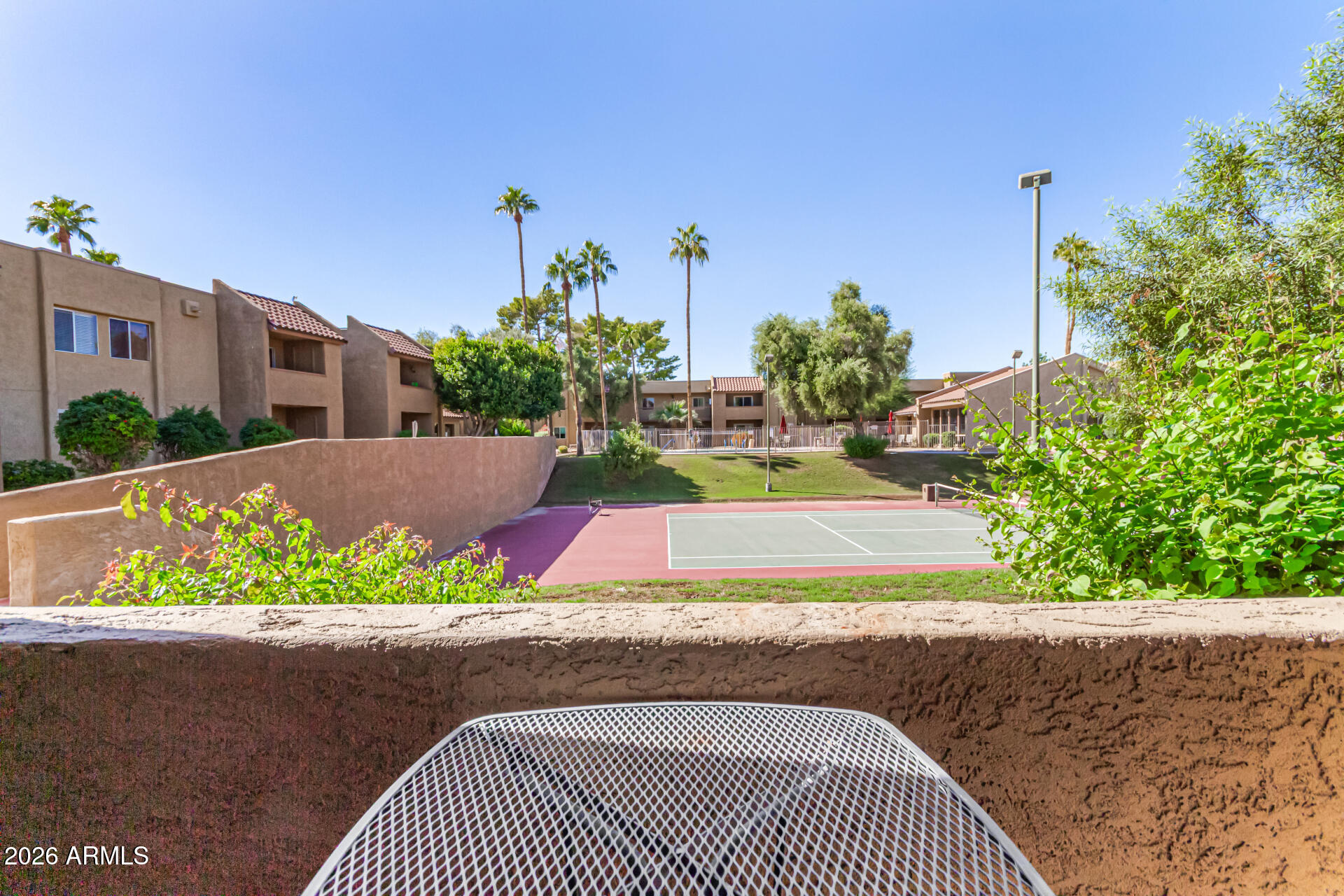 5877 North Granite Reef Road, Unit 1133 Scottsdale, AZ 85250 - Photo 24 of 33 a view of a yard with a fountain