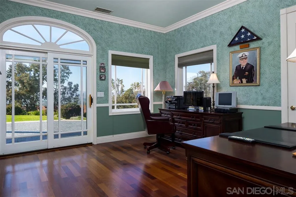 12966 Lomas Verdes Drive Poway, CA 92064 - Photo 15 of 25 a living room with furniture and a floor to ceiling window