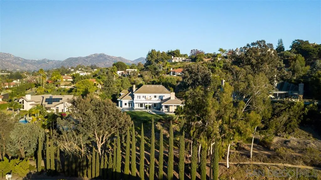 12966 Lomas Verdes Drive Poway, CA 92064 - Photo 2 of 25 an aerial view of a house with a yard