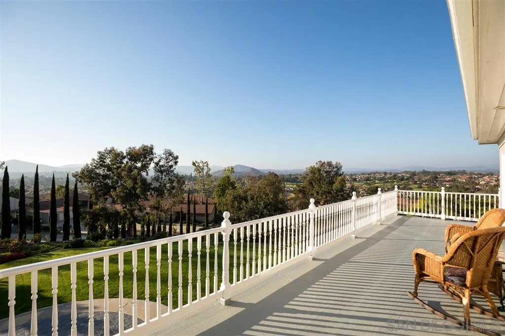 12966 Lomas Verdes Drive Poway, CA 92064 - Photo 21 of 25 a view of a roof deck with couches and wooden floor