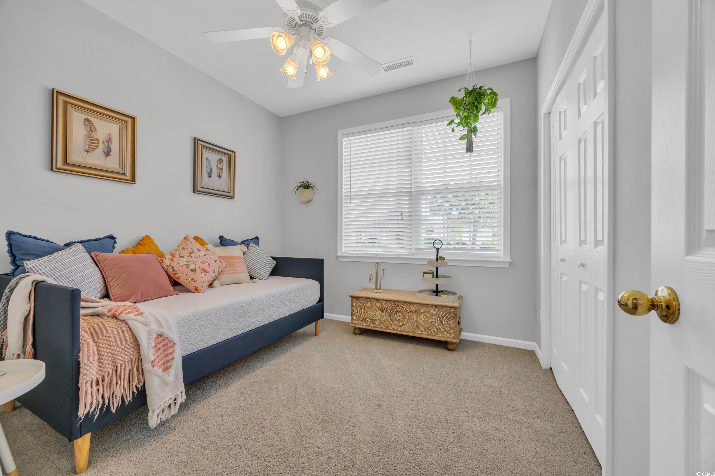 1451 Virginia Pine Drive Longs, SC 29568 - Photo 19 of 29 Carpeted bedroom featuring a closet, baseboards, a