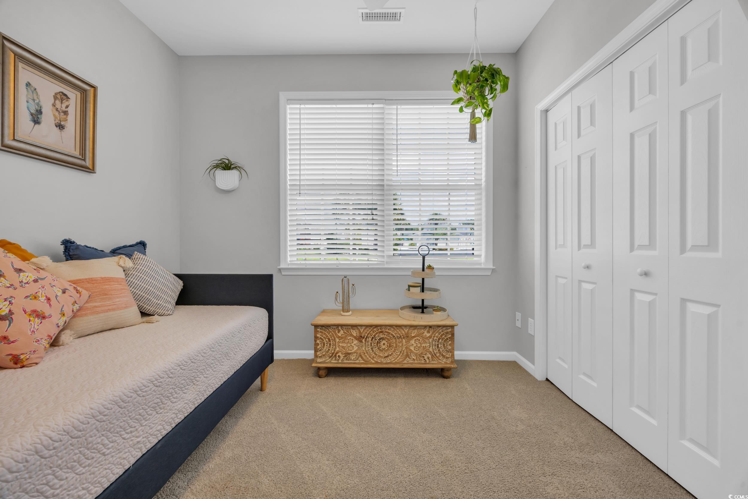 1451 Virginia Pine Drive Longs, SC 29568 - Photo 20 of 29 Carpeted bedroom featuring baseboards and a closet