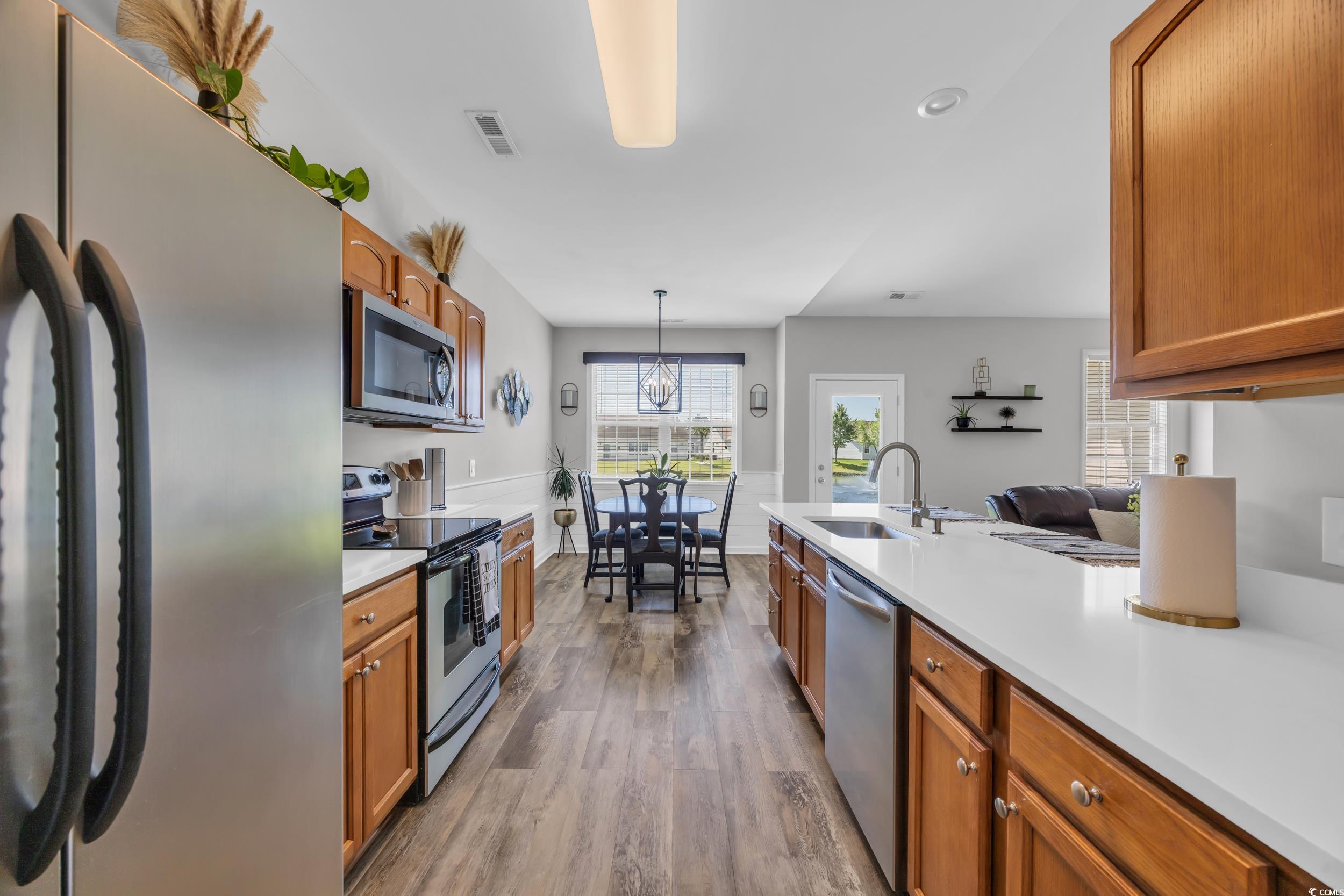 1451 Virginia Pine Drive Longs, SC 29568 - Photo 10 of 29 Kitchen with stainless steel appliances, a sink, w