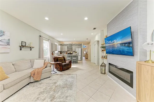a view of walk in closet with clothes