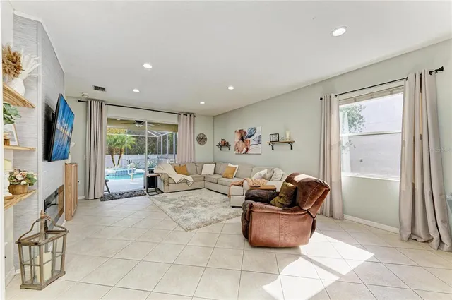 a view of a swimming pool with a patio