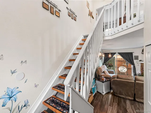a view of entryway with wooden floor