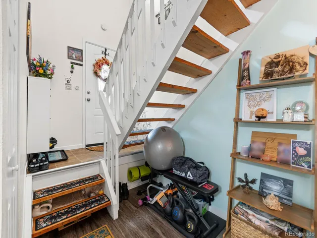 a room with toys and wooden floor