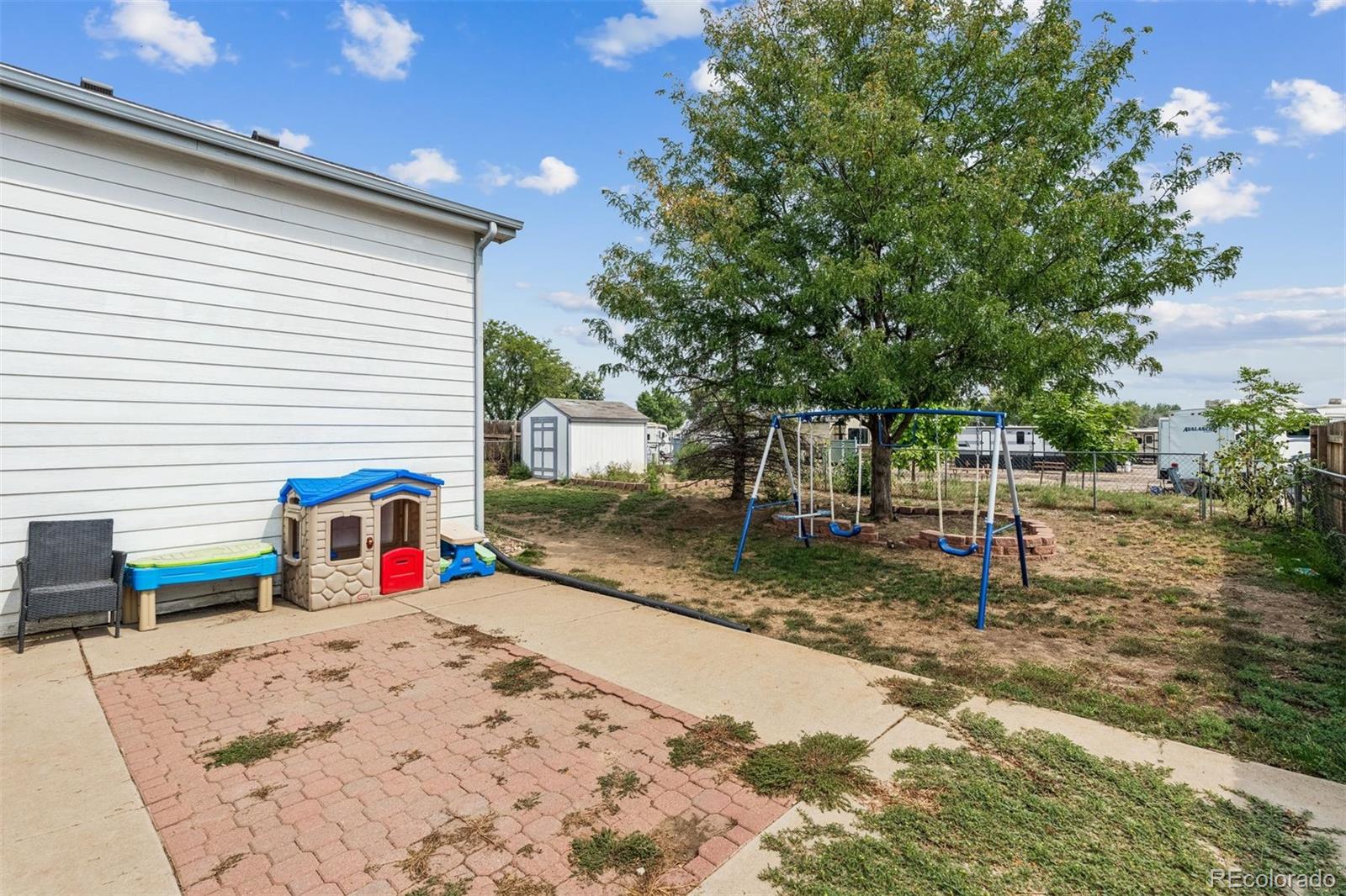 3820 Riverside Parkway Evans, CO 80620 - Photo 22 of 25 a view of the backyard of the house