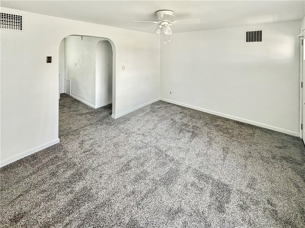 8411 Pitsburg-Laura Road Arcanum, OH 45304 - Photo 3 of 16 This versatile room offers an inviting atmosphere with neutral tones, awaiting your personal touch.